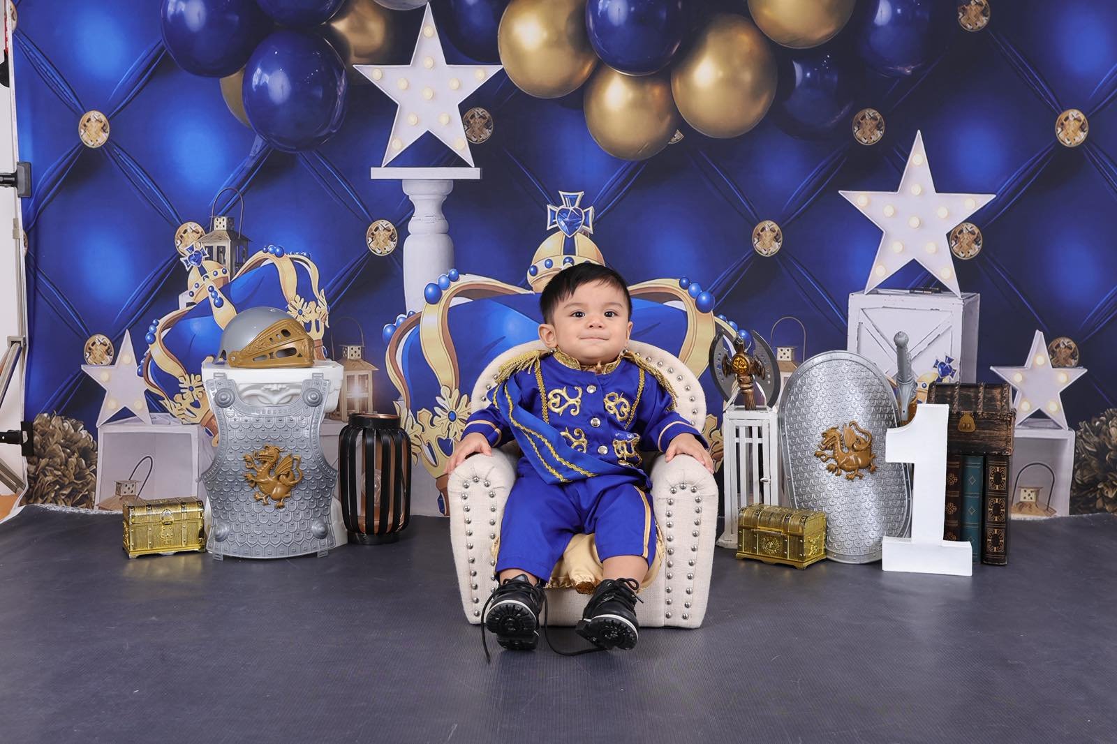 Archer sitting on prince armchair